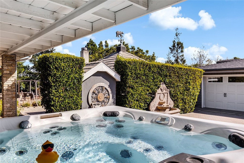 2212 Rim Road Duarte, CA 91008 - Photo 46 of 52 a bathroom with a sink mirror and vanity