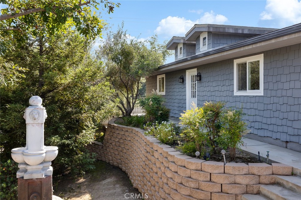 2212 Rim Road Duarte, CA 91008 - Photo 47 of 52 a front view of a house with garden