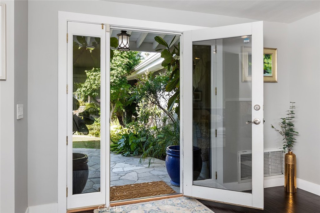 2212 Rim Road Duarte, CA 91008 - Photo 8 of 52 a view of a glass door with a glass door