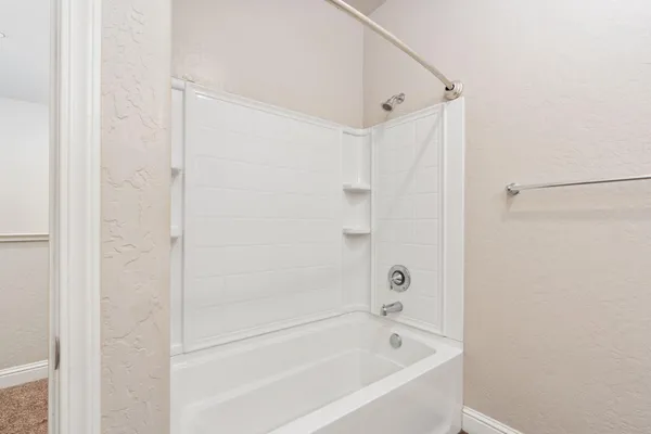 a view of a hallway with shelf