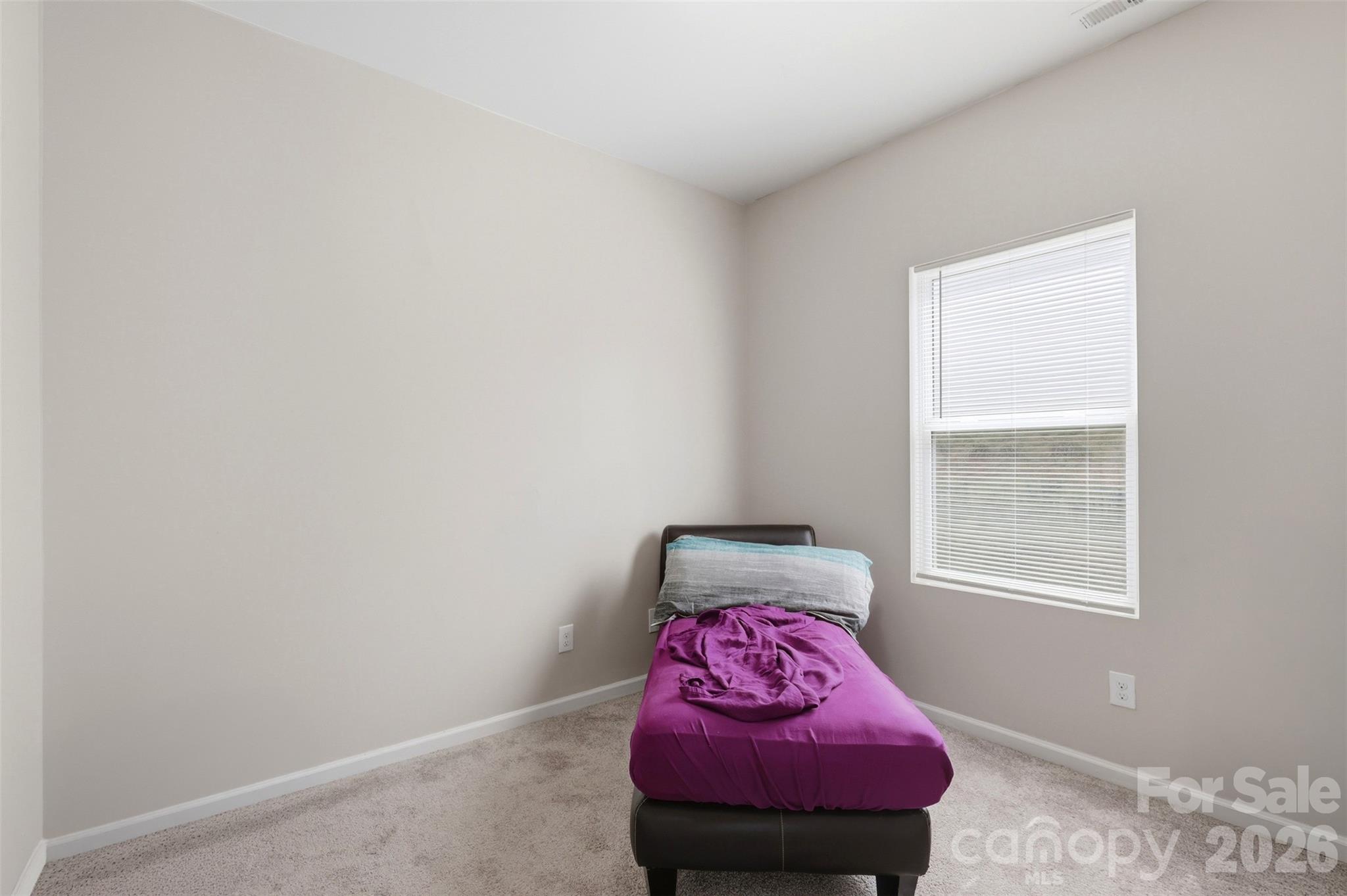 7017 Whitewater Loop Lowell, NC 28098 - Photo 12 of 39 a room with a small window