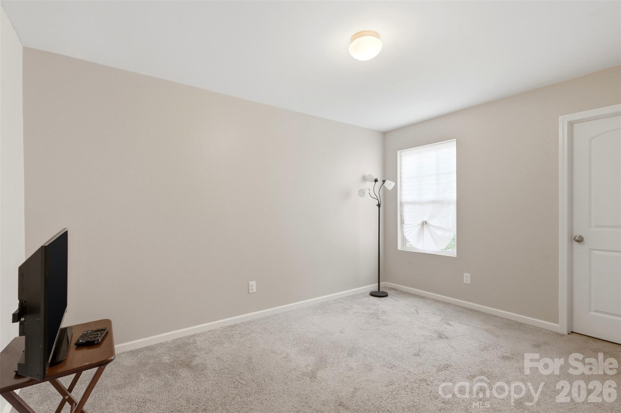 7017 Whitewater Loop Lowell, NC 28098 - Photo 25 of 39 an empty room with windows