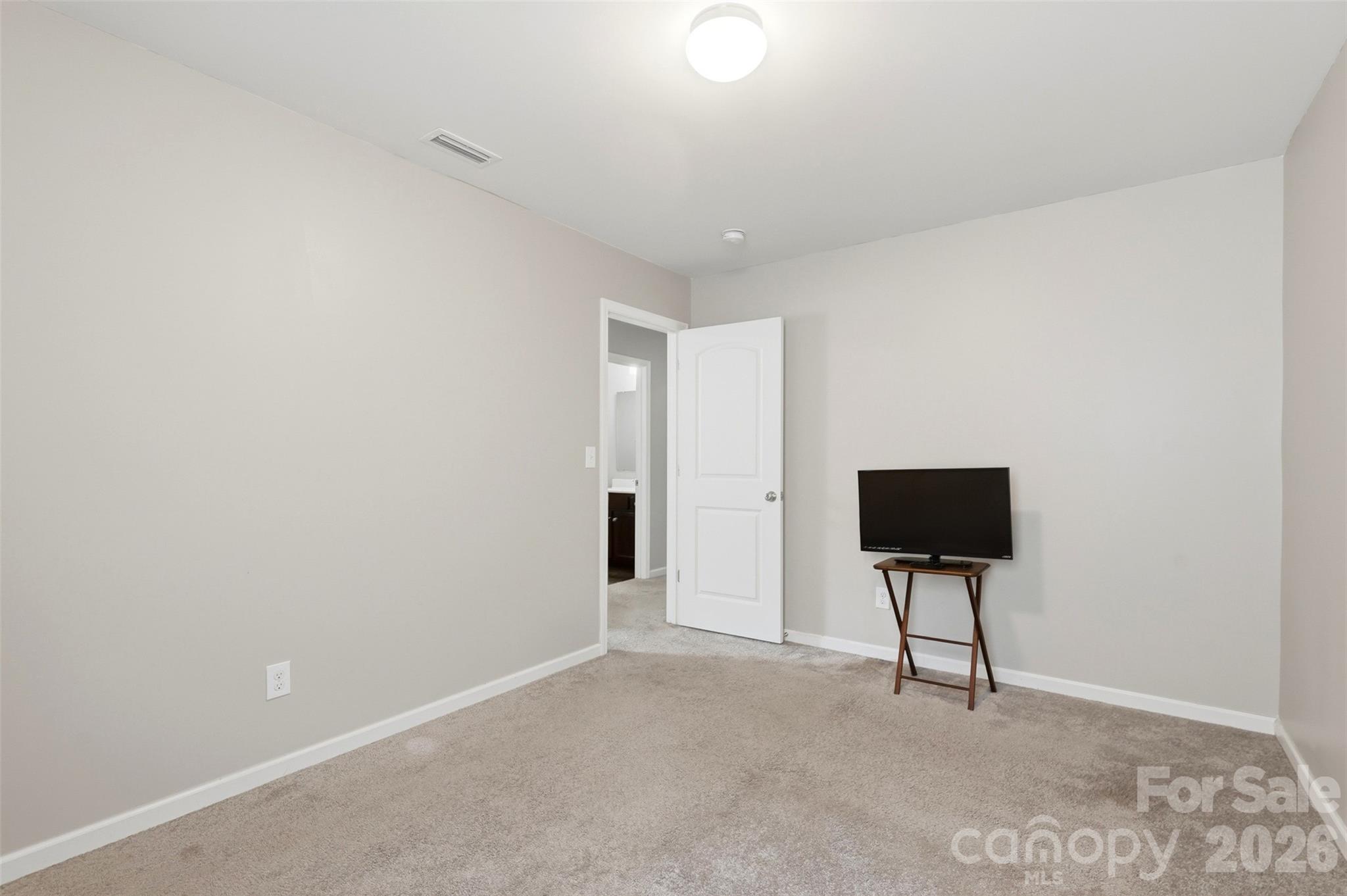 7017 Whitewater Loop Lowell, NC 28098 - Photo 26 of 39 a view of room with wooden floor and fan