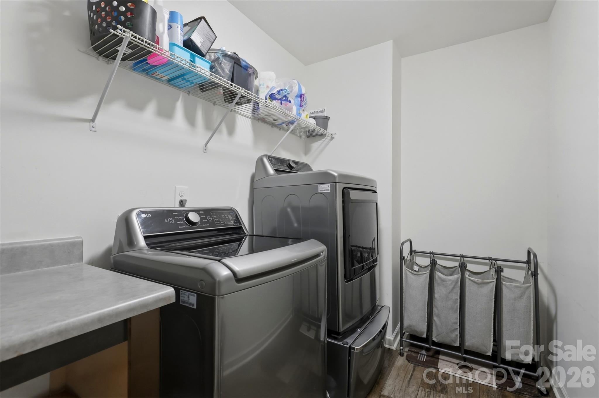 7017 Whitewater Loop Lowell, NC 28098 - Photo 28 of 39 a utility room with dryer and washer