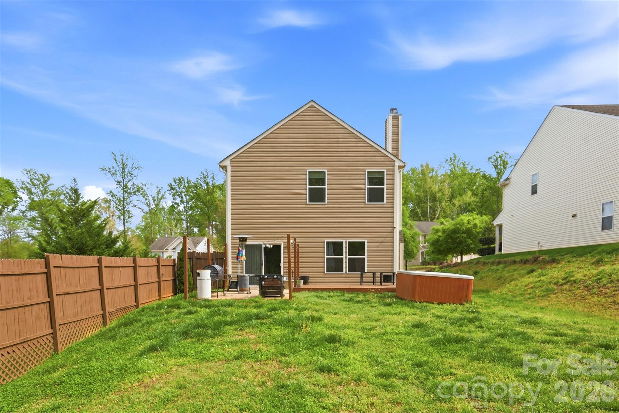 7017 Whitewater Loop Lowell, NC 28098 - Photo 31 of 39 a view of a house with backyard