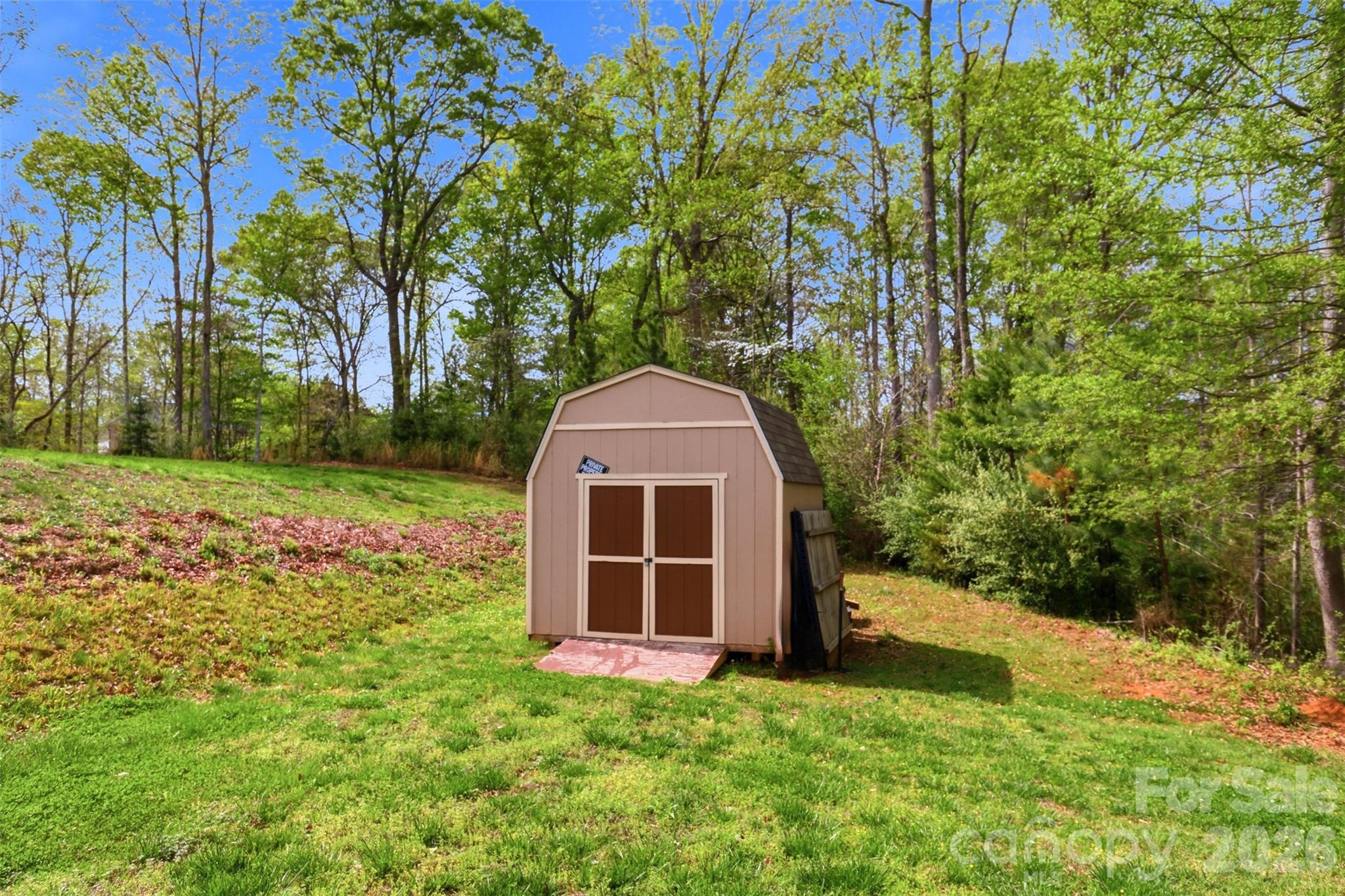 7017 Whitewater Loop Lowell, NC 28098 - Photo 35 of 39 a front view of a house with a yard