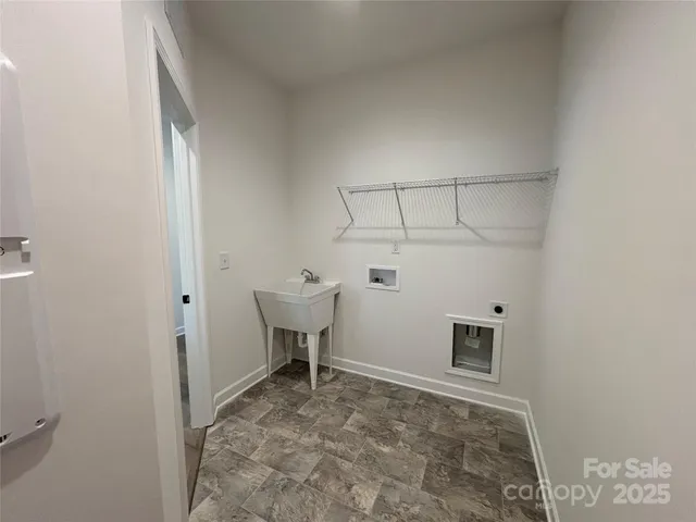 a view of a bedroom with a workspace