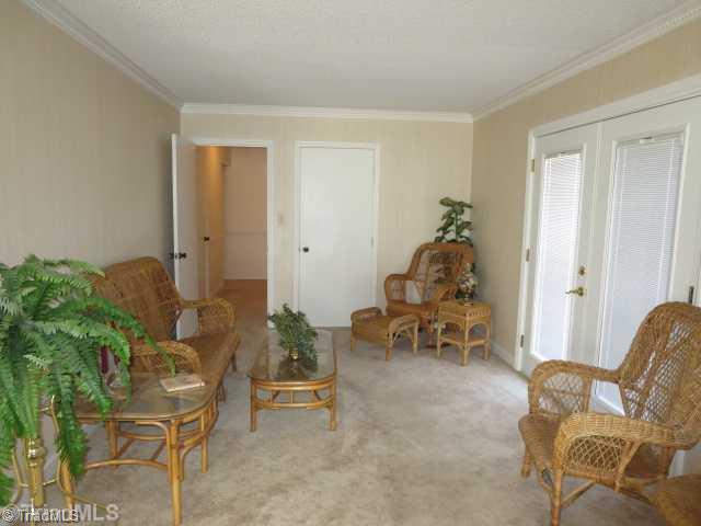 8336 Center Grove Church Road Clemmons, NC 27012 - Photo 11 of 16 Other. Sitting Area in Master Bedroom, Leads to Deck off Master Bedroom