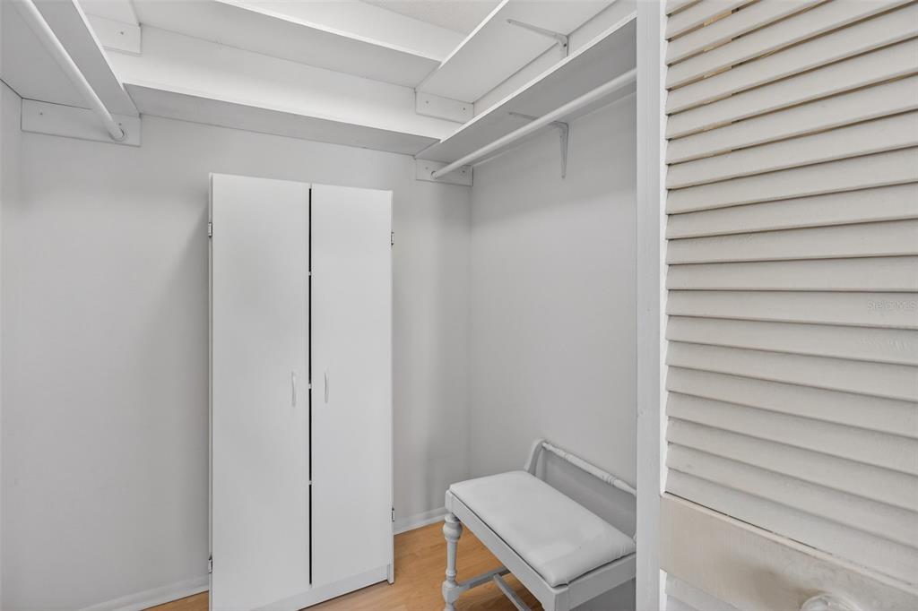 4841 Boonesboro Court New Port Richey, FL 34655 - Photo 18 of 44 a room with a bench