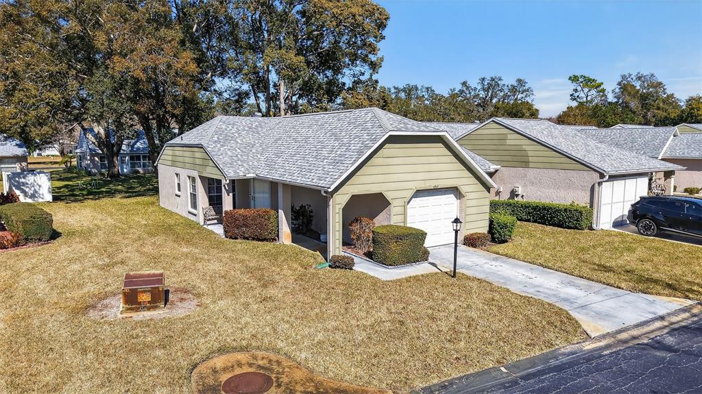 4841 Boonesboro Court New Port Richey, FL 34655 - Photo 28 of 44 front view of a house with a yard