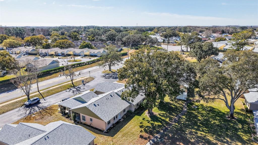 4841 Boonesboro Court New Port Richey, FL 34655 - Photo 30 of 44 an aerial view of a house with a yard