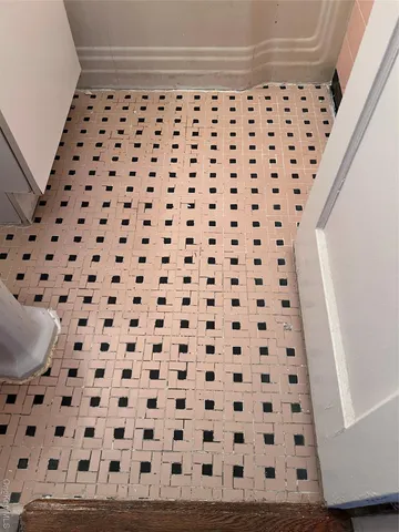 a view of a black and white checkered floor