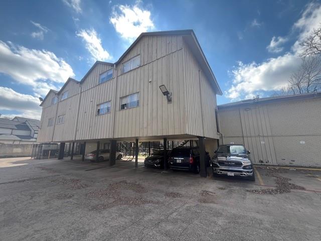 5000 Bowser Avenue, Unit 213 Dallas, TX 75209 - Photo 4 of 4 a car parked in front of a house