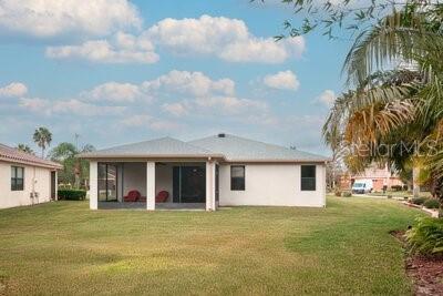 824 Ebb Tide Lane Kissimmee, FL 34759 - Photo 37 of 60 a view of a house with a backyard