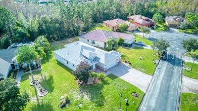 824 Ebb Tide Lane Kissimmee, FL 34759 - Photo 40 of 60 an aerial view of house with yard