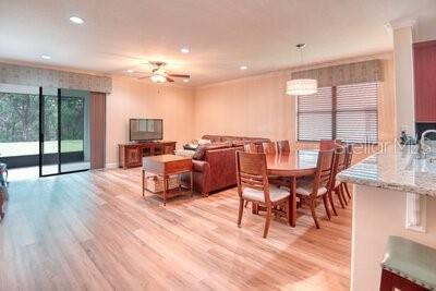 824 Ebb Tide Lane Kissimmee, FL 34759 - Photo 10 of 60 a view of a dining room with furniture window and outside view