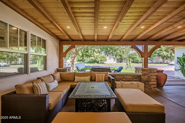 a living room with a couch and a flat screen tv
