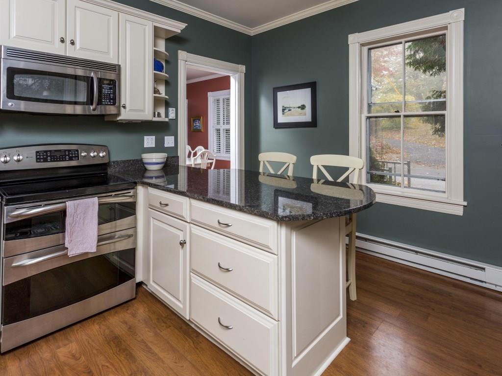 12 Logan Road West Boothbay Harbor, ME 04575 - Photo 12 of 27 The kitchen with painted wood...