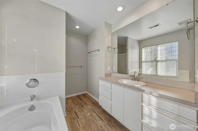 a bathroom with a sink and a bathtub
