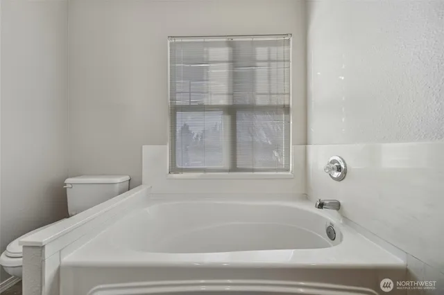 a bathroom with a bathtub