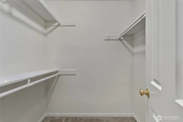 a view of small space with racks on the wall