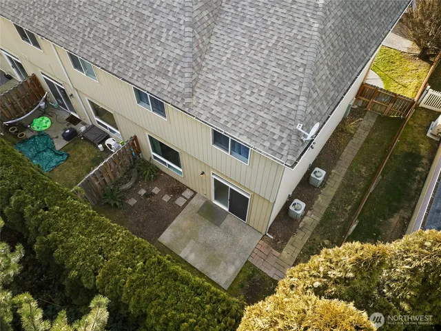 a picture of a bench in front of a wall