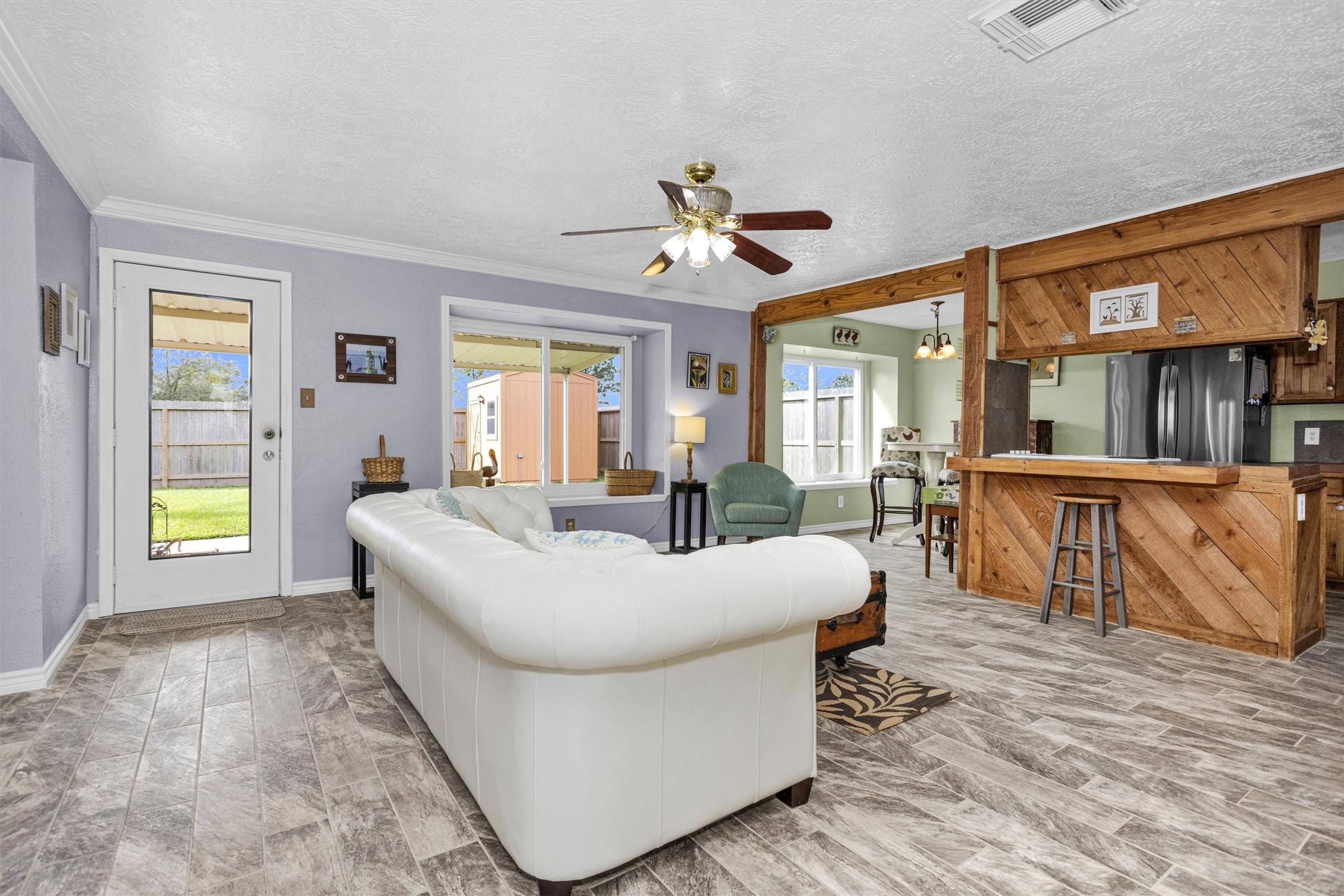 8422 Oakhaven Road La Porte, TX 77571 - Photo 9 of 46 Open layout connecting the living area to the dining space for easy entertaining.