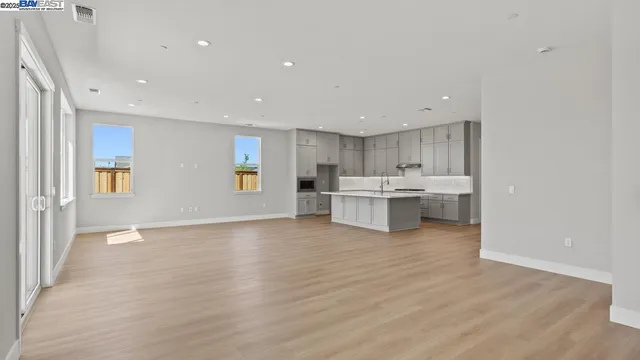 a view of kitchen with wooden floor