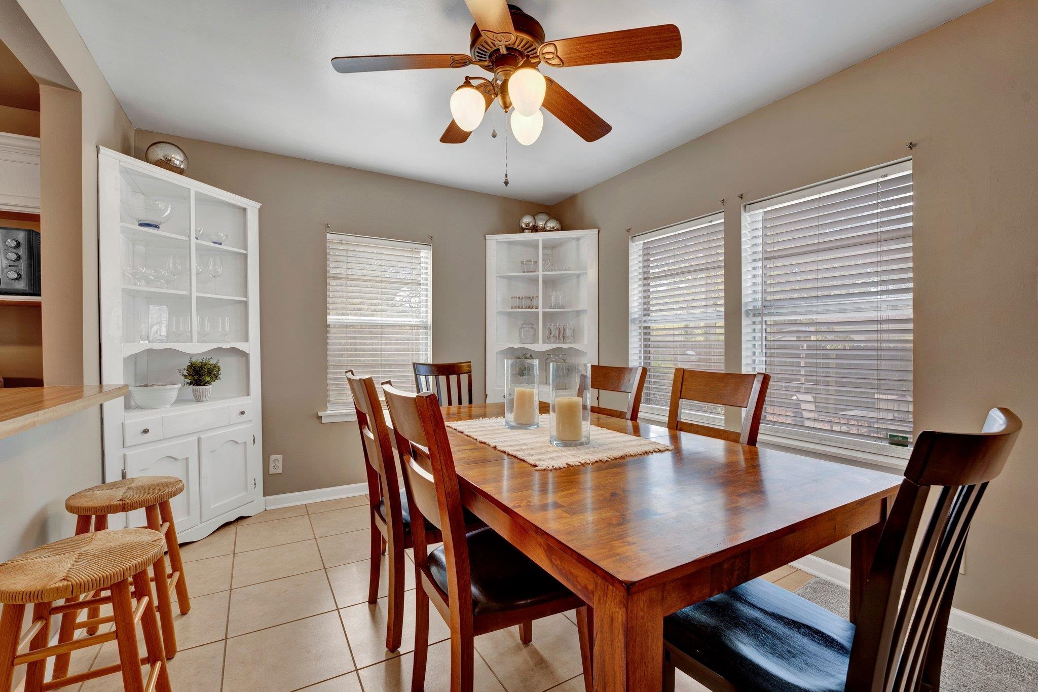 4891 Flamingo Road Memphis, TN 38117 - Photo 20 of 34 a view of a dining room with furniture and wooden floor