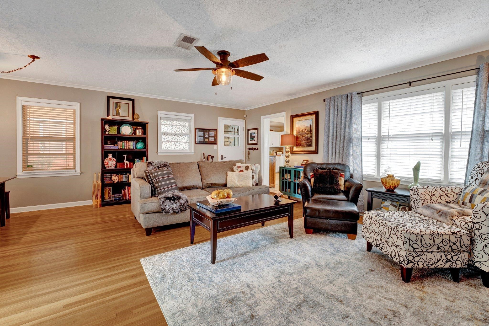 4891 Flamingo Road Memphis, TN 38117 - Photo 9 of 34 a living room with furniture fireplace and a window