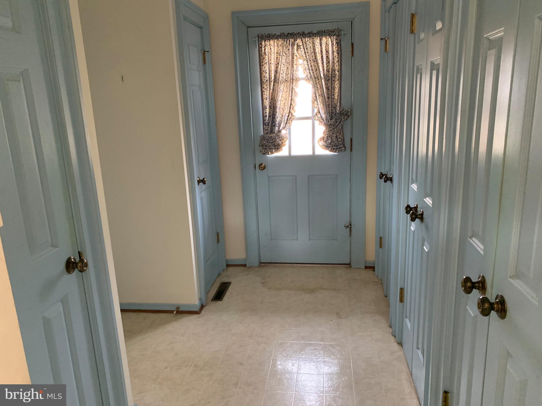 7603 Irongate Lane Frederick, MD 21702 - Photo 11 of 43 an empty room with windows