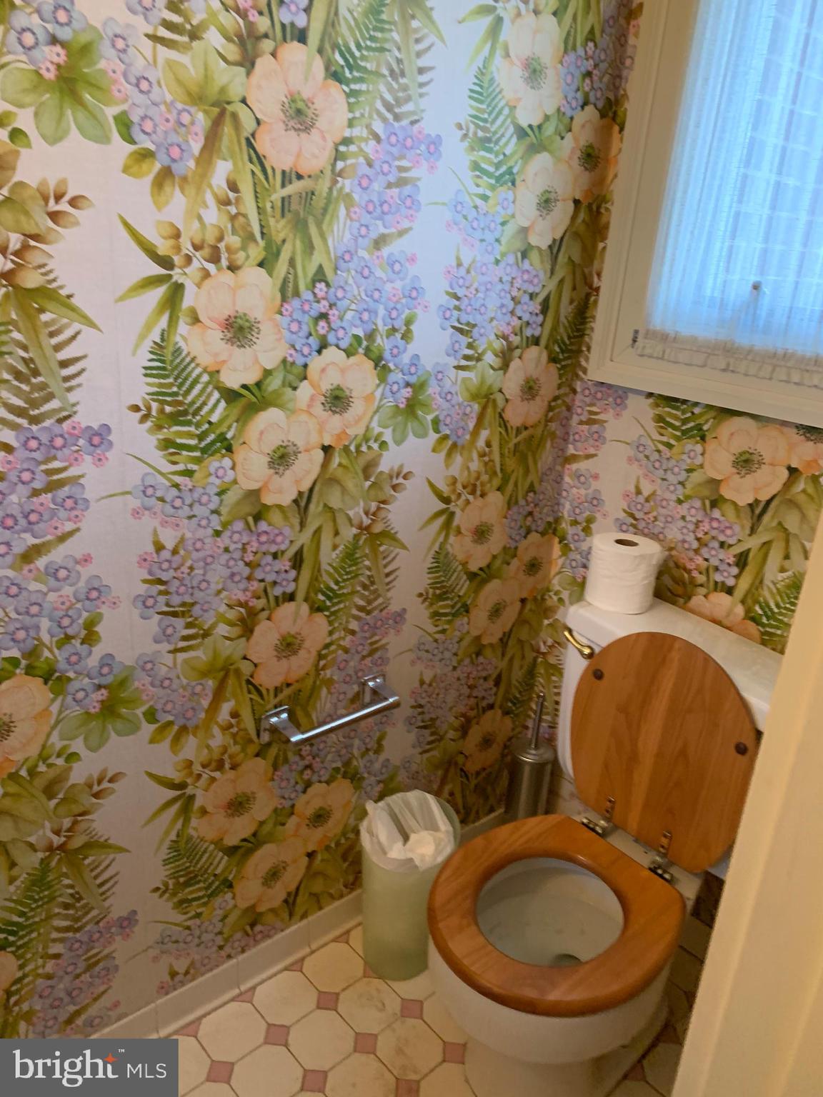 7603 Irongate Lane Frederick, MD 21702 - Photo 12 of 43 a bathroom with a toilet and a sink