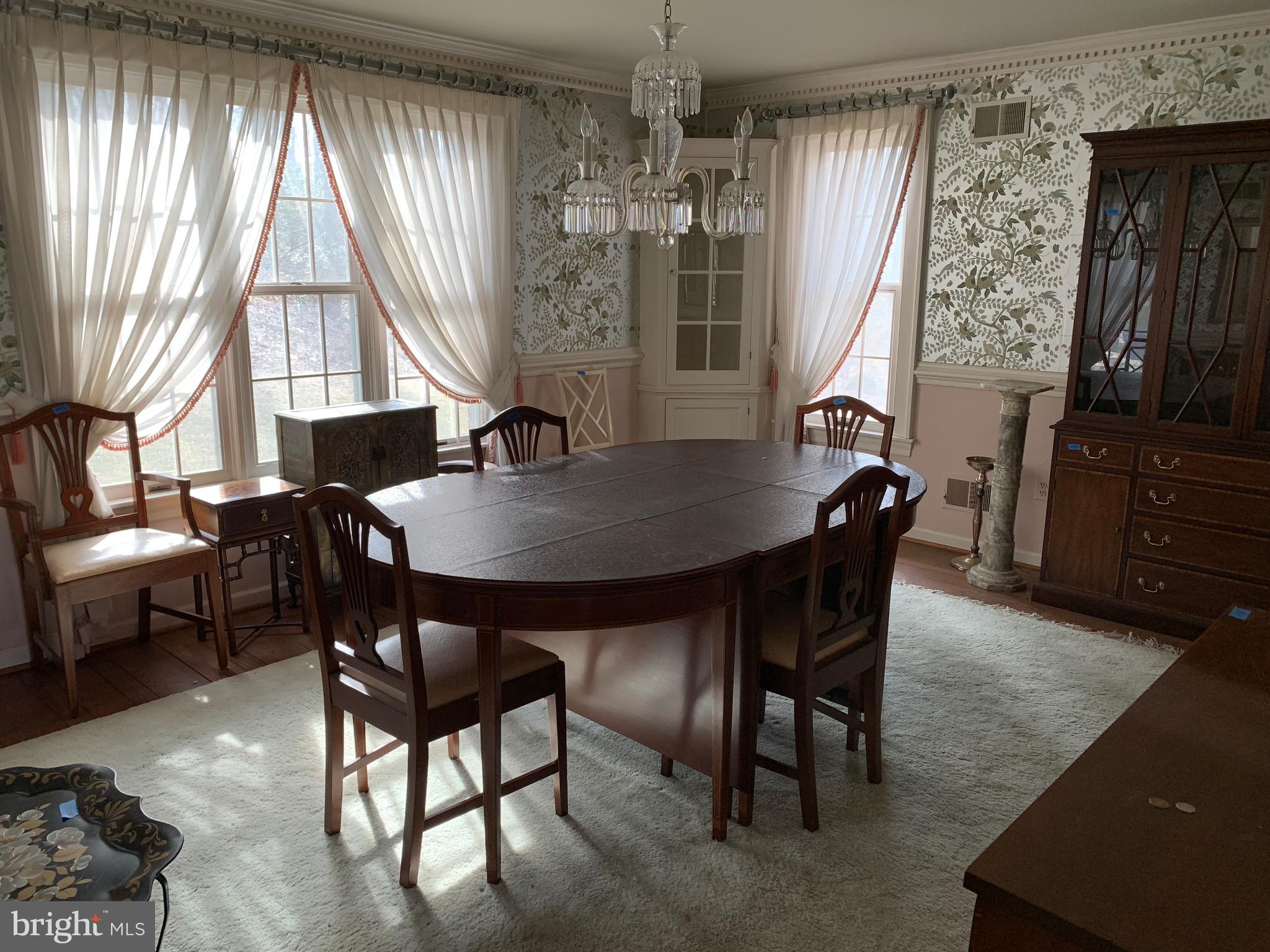 7603 Irongate Lane Frederick, MD 21702 - Photo 24 of 43 a view of a dining room with furniture window and outside view