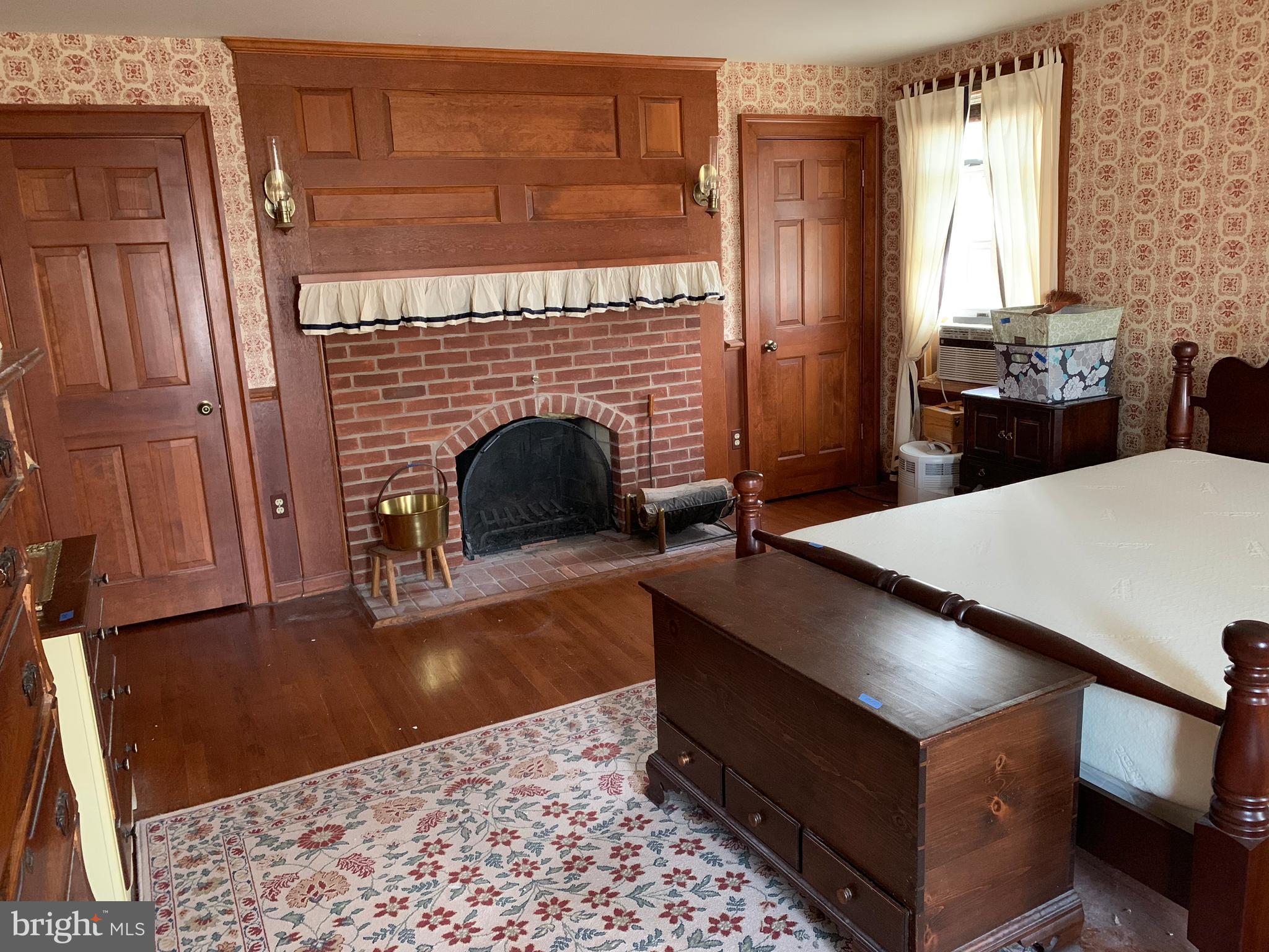 7603 Irongate Lane Frederick, MD 21702 - Photo 28 of 43 a living room with furniture and a fireplace