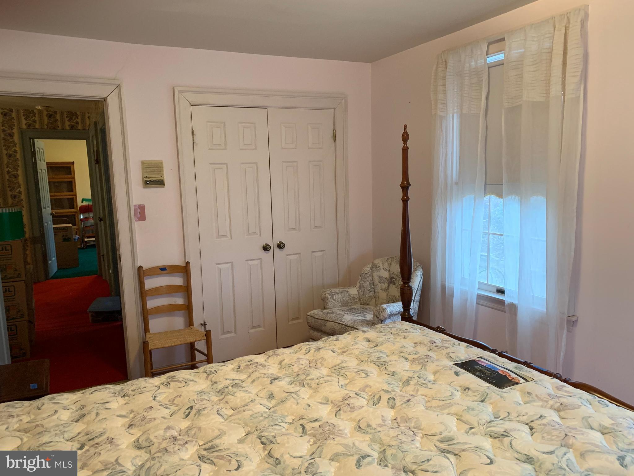7603 Irongate Lane Frederick, MD 21702 - Photo 39 of 43 a bedroom with a bed and a dresser