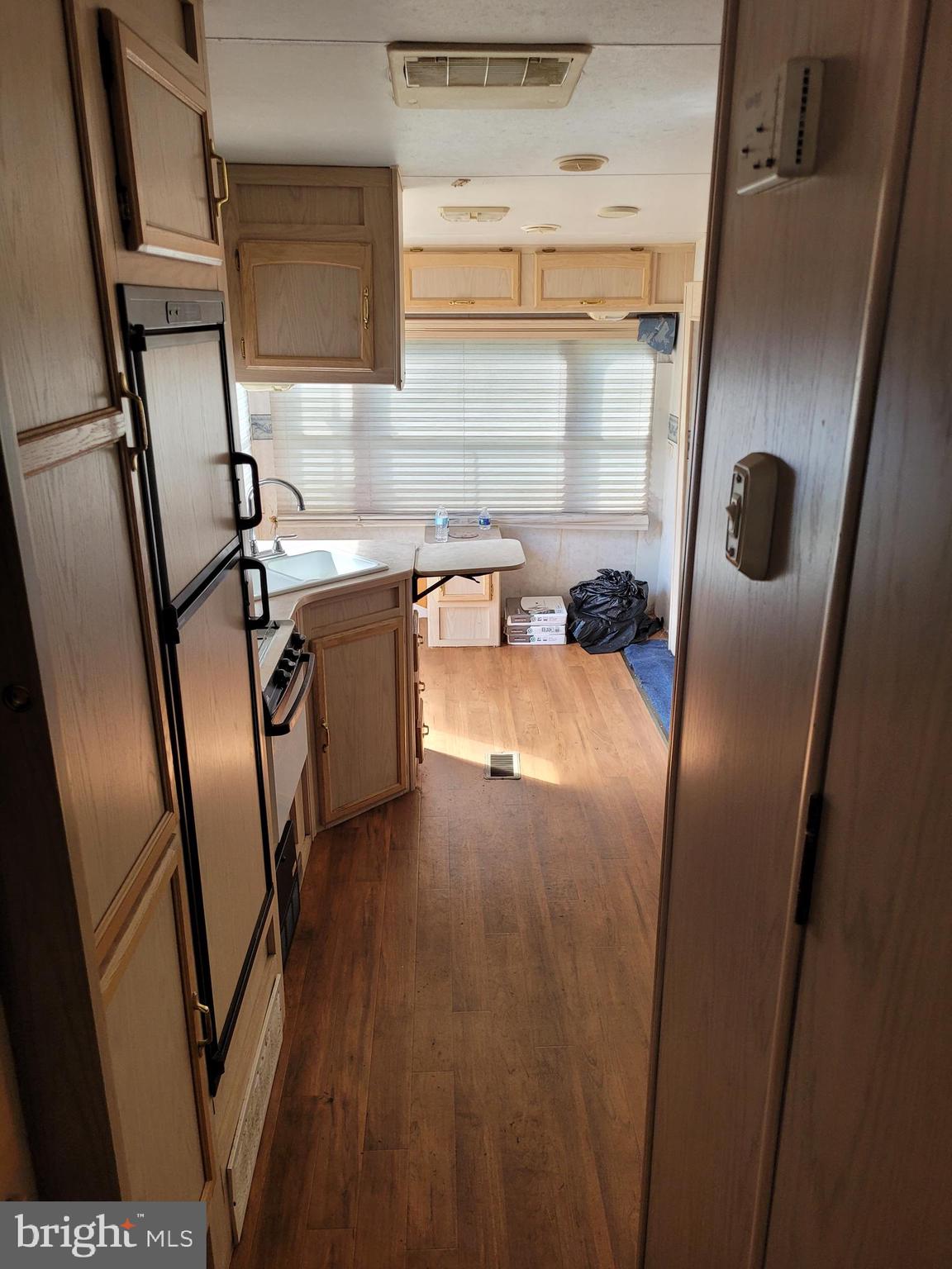 0 South Burlington Road Bridgeton, NJ 08302 - Photo 10 of 18 a kitchen with metallic refrigerator and sink