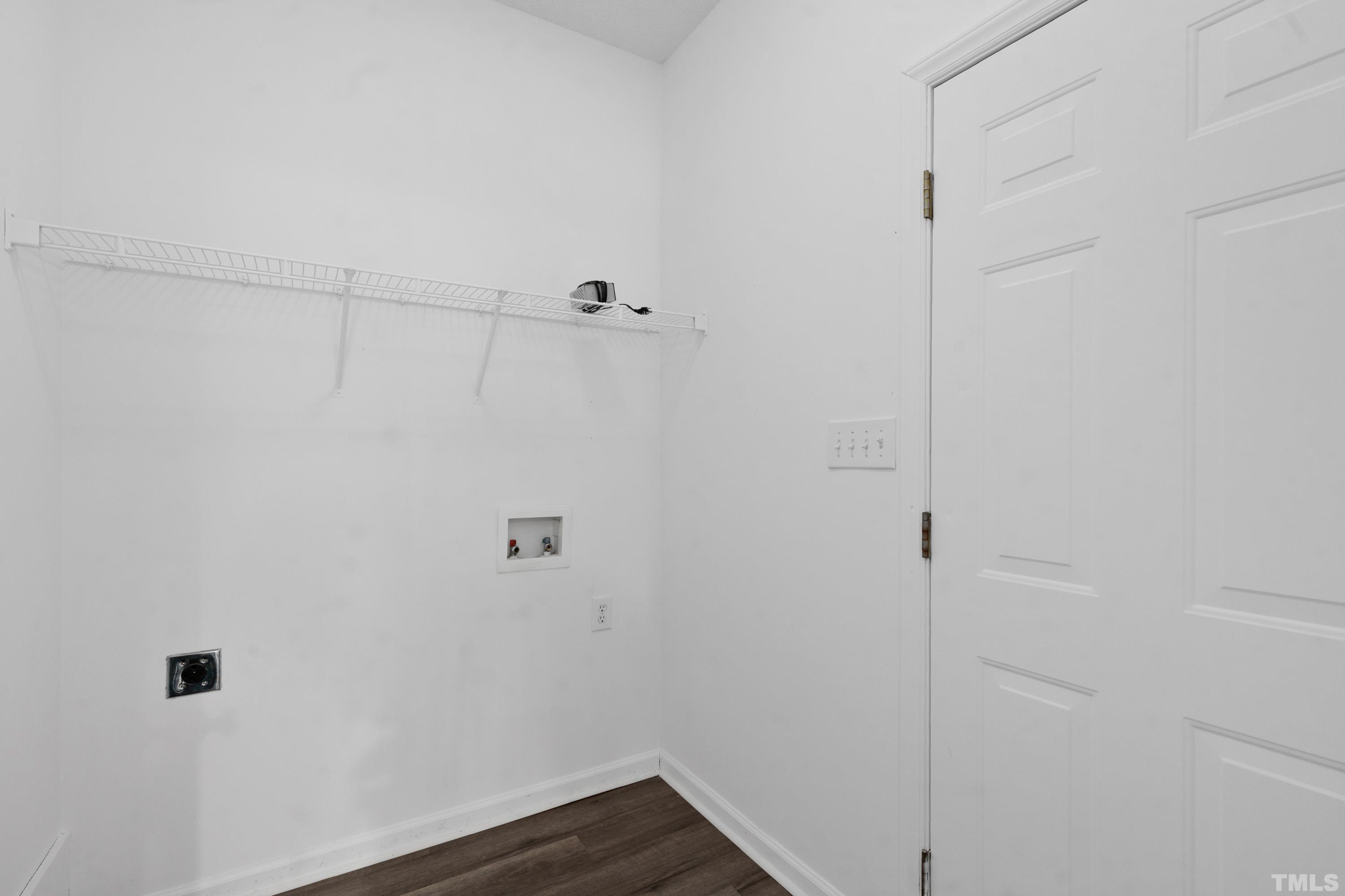 110 Saddle Ridge Drive Willow Spring, NC 27592 - Photo 14 of 32 a view of small space with racks on the wall