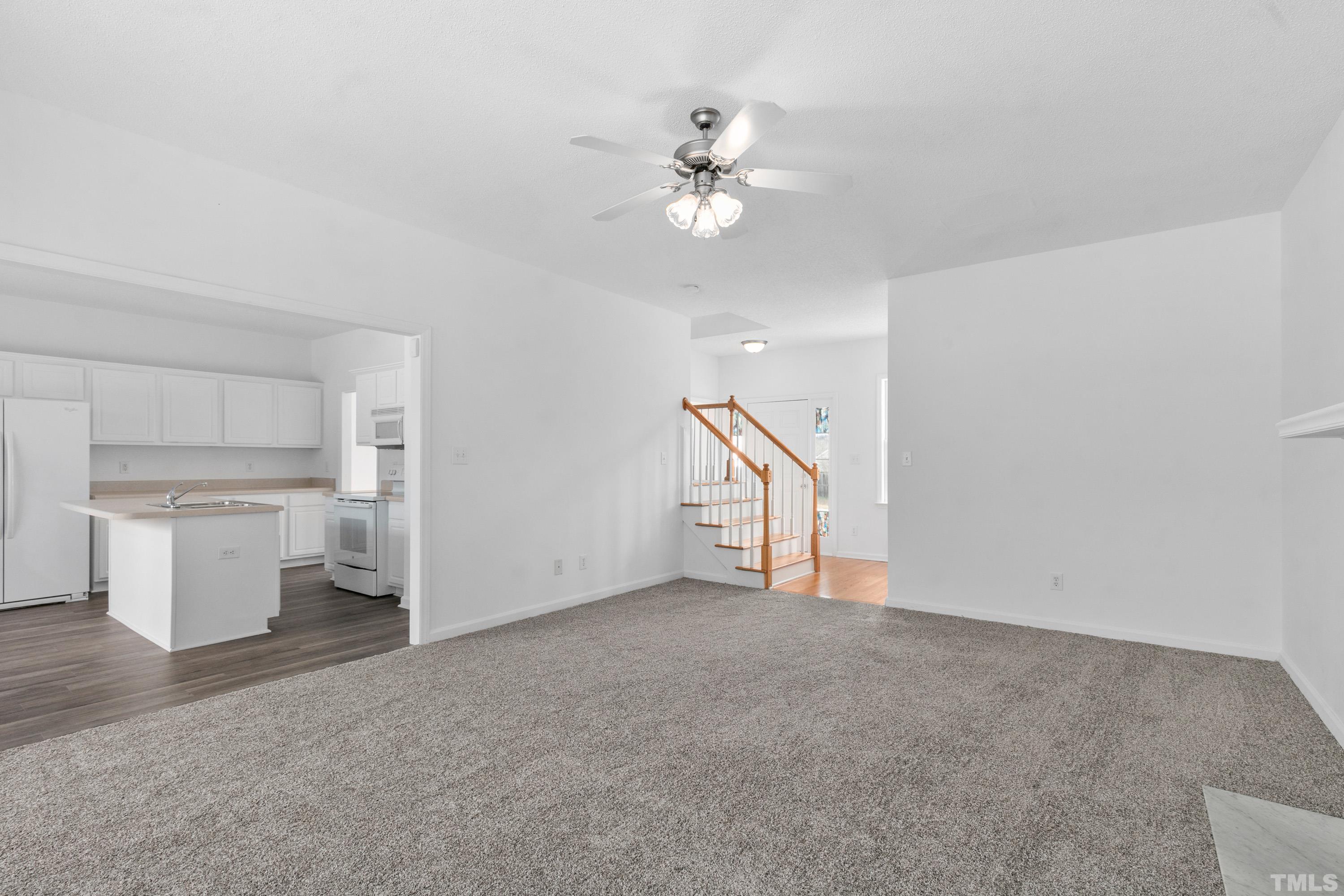110 Saddle Ridge Drive Willow Spring, NC 27592 - Photo 8 of 32 a view of an empty room with a sink