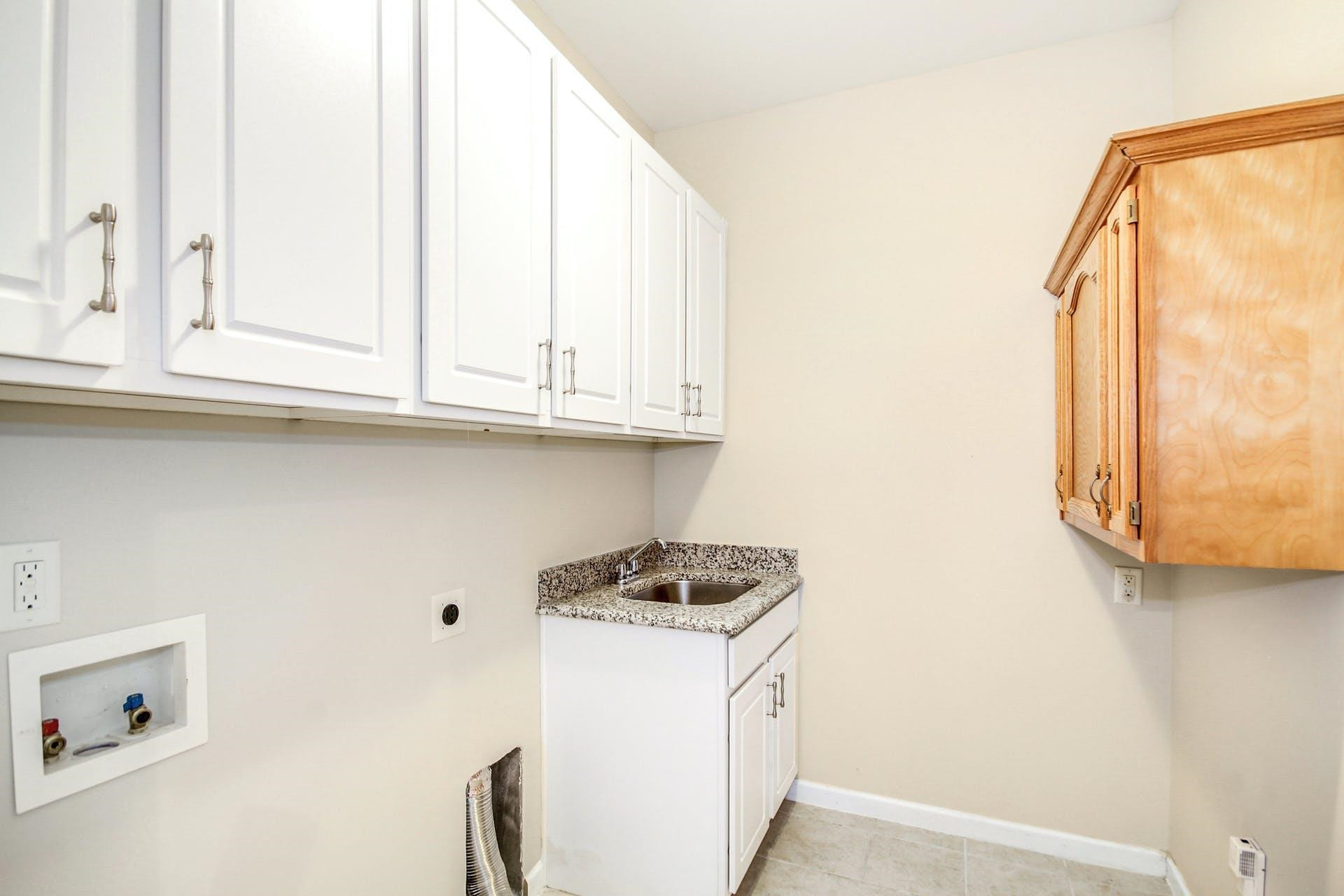 1524 Rodessa Run Raleigh, NC 27607 - Photo 16 of 25 First Floor Laundry