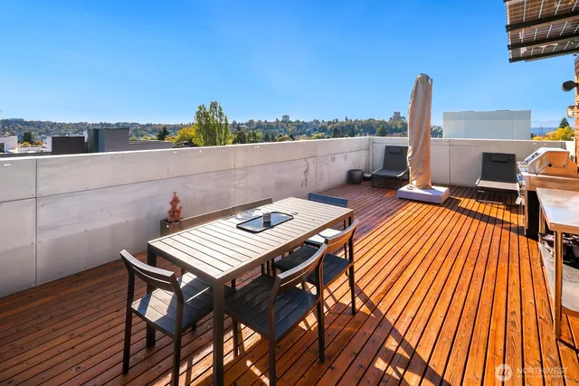 a terrace of a house with outdoor seating