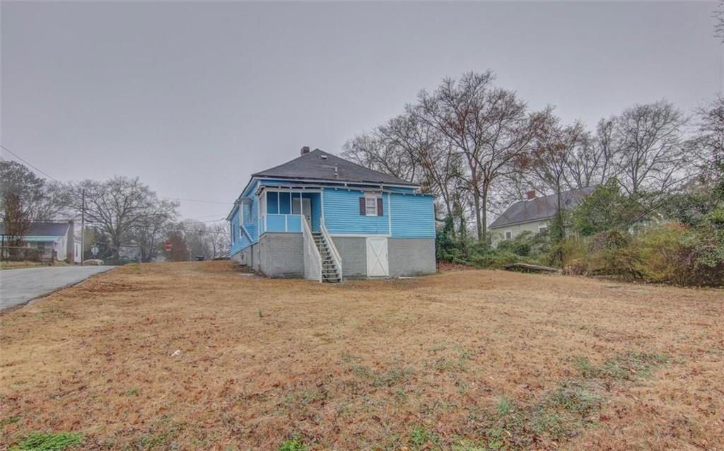 1730 Spring Street Northeast Conyers, GA 30012 - Photo 2 of 2 a house with a outdoor space