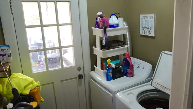 a room with a chair and tables