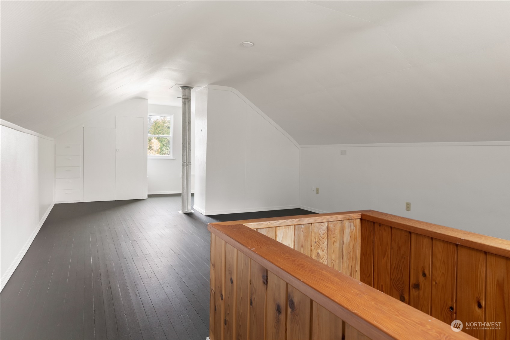 4736 Sharpe Road Anacortes, WA 98221 - Photo 13 of 40 a view of empty room with wooden floor
