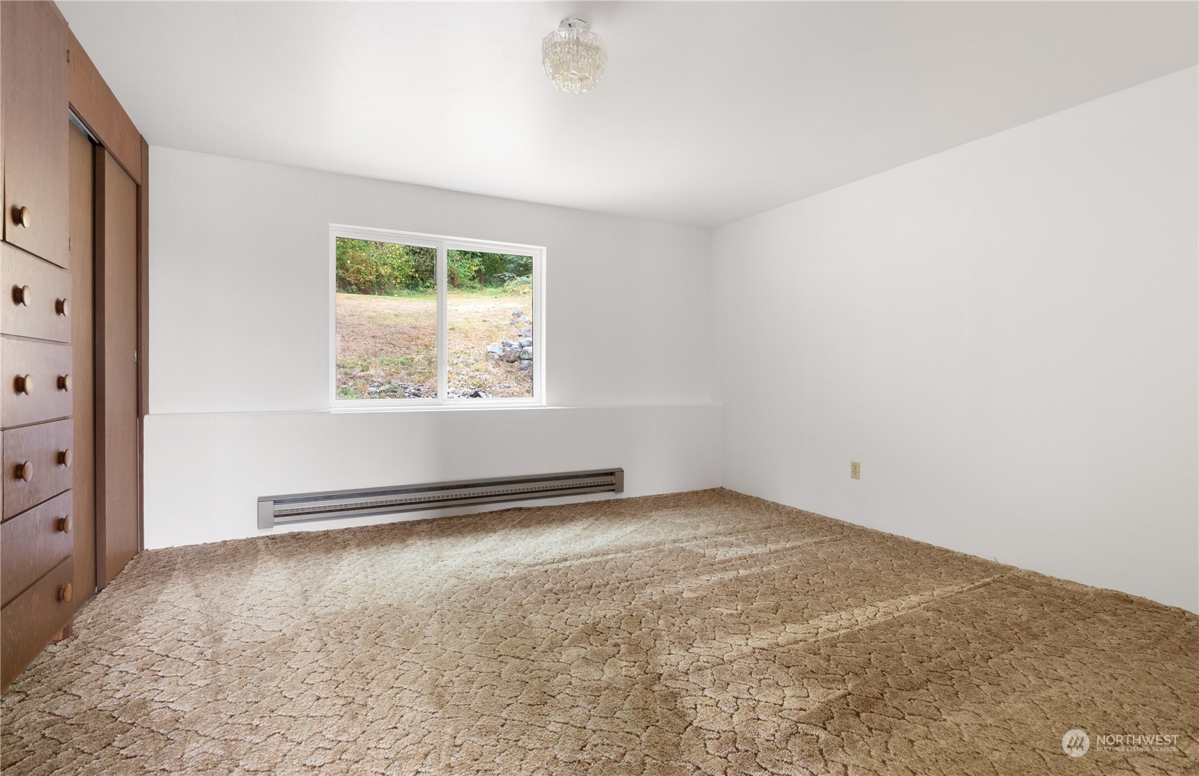 4736 Sharpe Road Anacortes, WA 98221 - Photo 23 of 40 an empty room with windows
