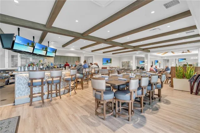 a view of a living room and dining room