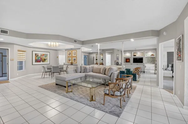 a living room with furniture and a table