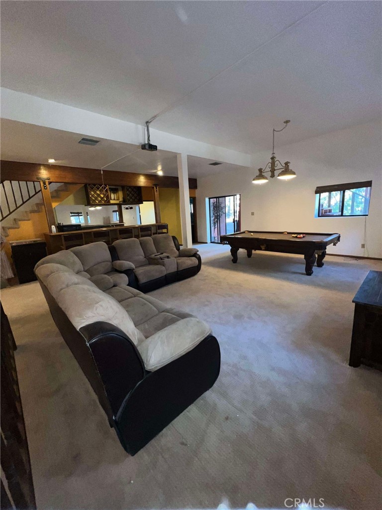 23109 Cardinal Road Wrightwood, CA 92397 - Photo 27 of 49 a living room with furniture and a table