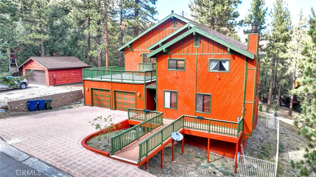 23109 Cardinal Road Wrightwood, CA 92397 - Photo 43 of 49 a backyard of a house with barbeque oven and outdoor seating