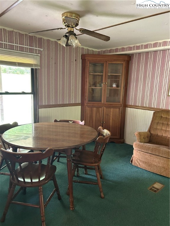 294 Walter Blevins Road Lansing, NC 28643 - Photo 13 of 15 a view of a dining room with furniture and window