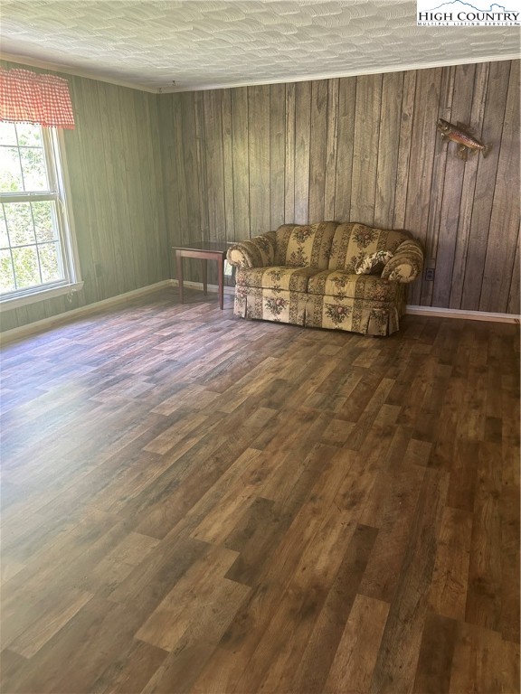 294 Walter Blevins Road Lansing, NC 28643 - Photo 2 of 15 a bed room with a bed and a window